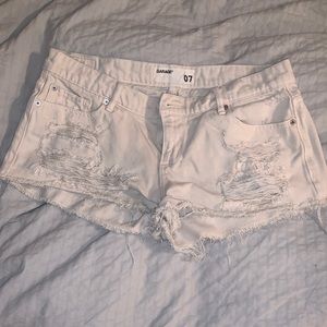 Garage ripped denim cream shorts